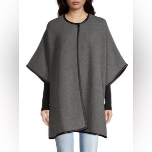 $895 SOFIA CASHMERE
Leather Trim Cashmere Doubleface Knit Cape one size